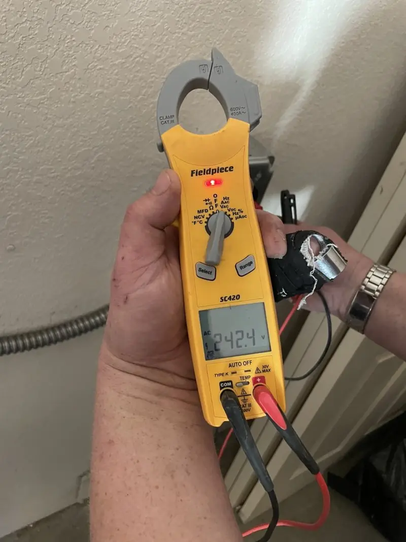 Voltage testing with clamp meter during Circuit Breaker Repair in Hornsby Bend